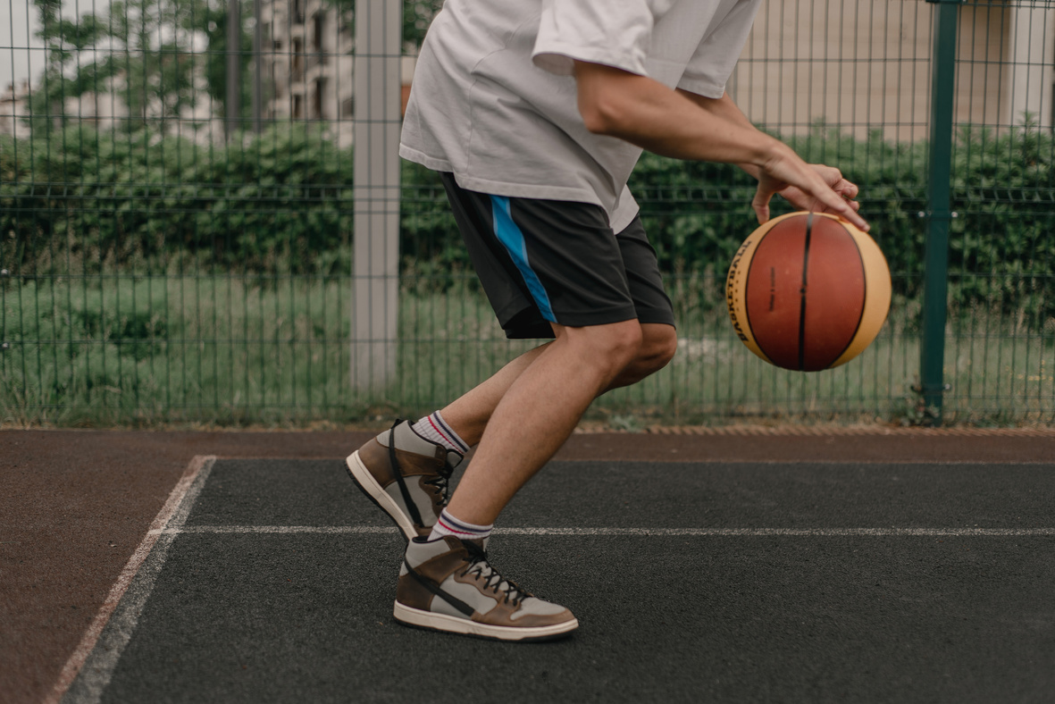 Person Dribbling a Ball